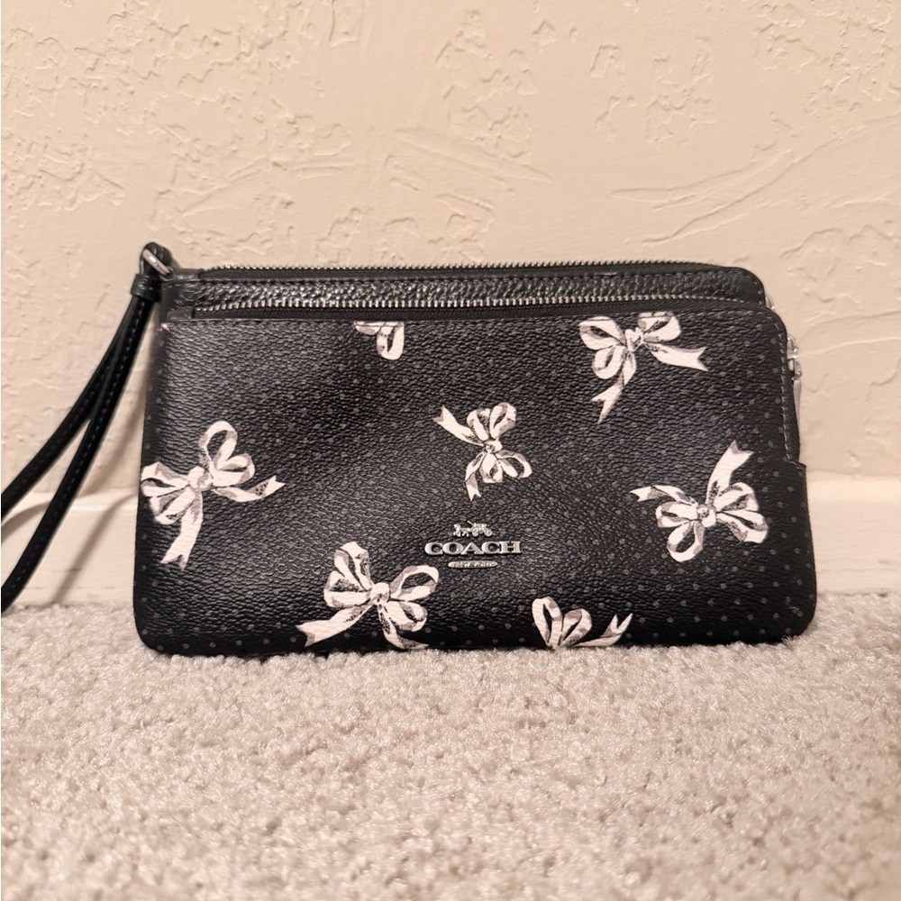 COACH Black Wristlet with White Bow Print